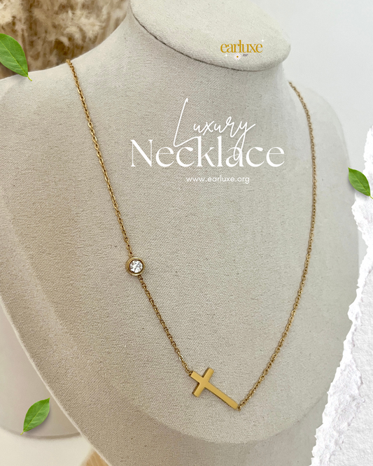 Cross and round diamond necklace