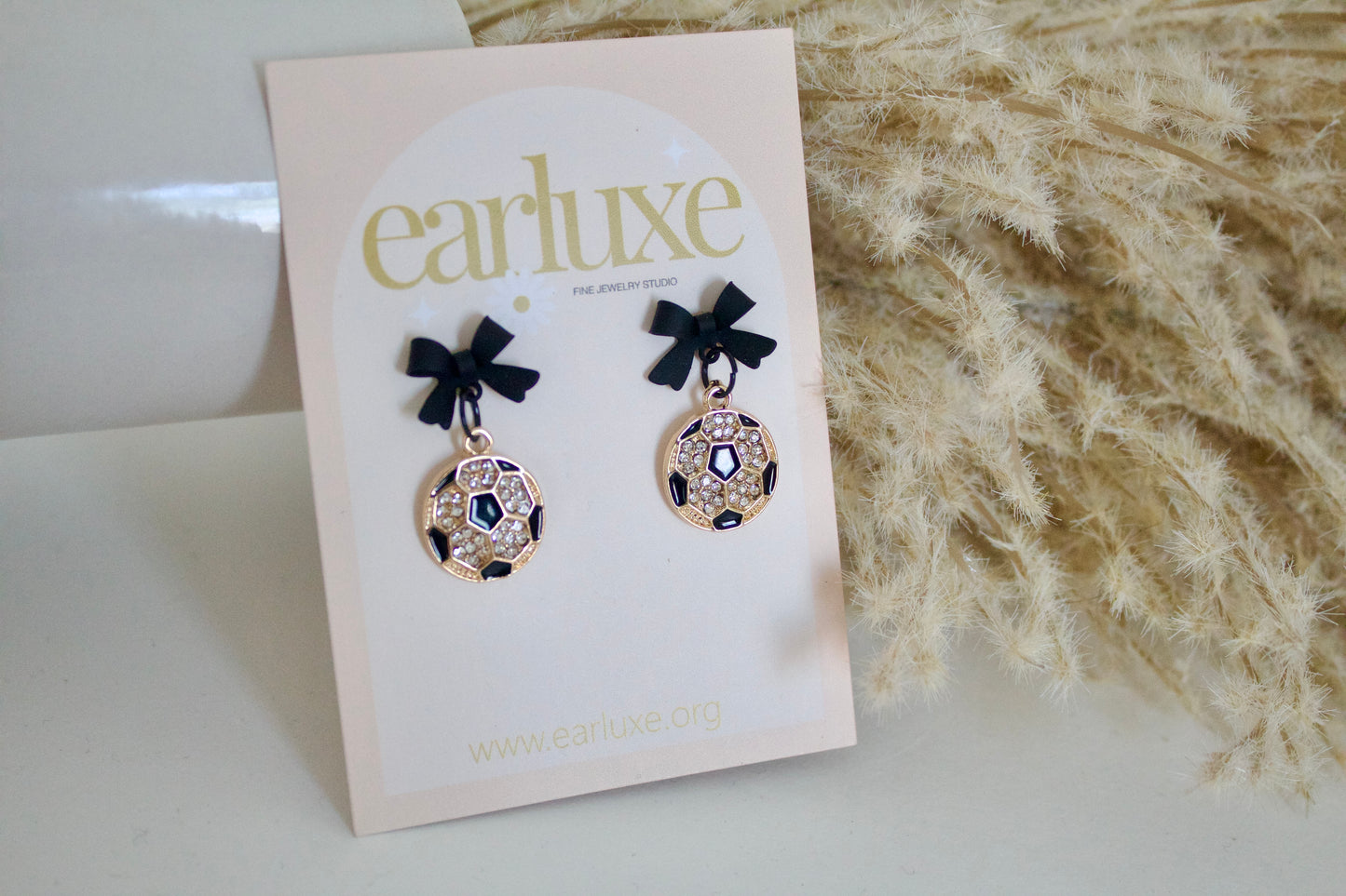 Sports bow earrings