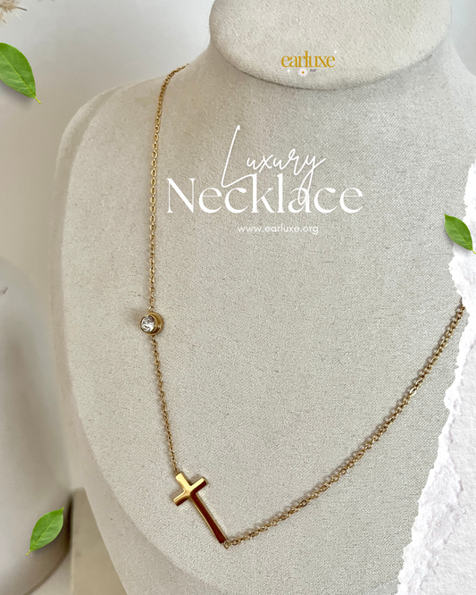 Cross and round diamond necklace